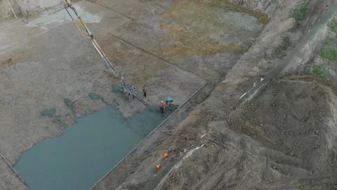 A pump pouring concrete at the construction site Video stock 145754265