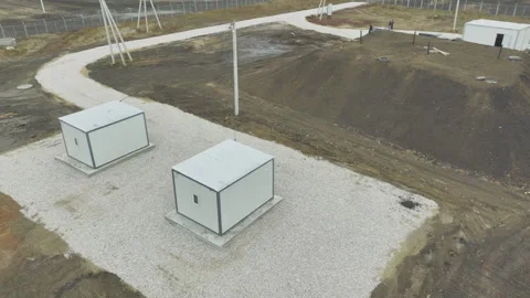 Pump station building and ground hill at industrial complex Stock Footage 266139879