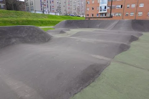 Pump track featuring a series of rollers and berms for bicycle training Stock Photos