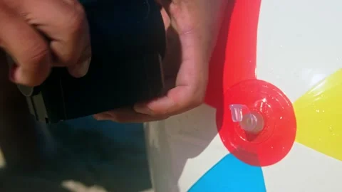 Pumping the beach ball Stock Footage 140783821