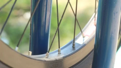 Pumping a bicycle wheel. Stock Footage 134122226