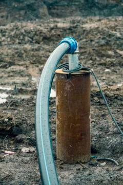 Pumping flood water using deep well 2 Stock Photos