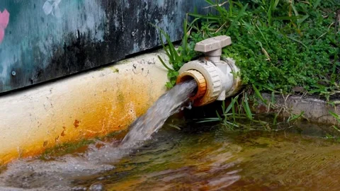 Pumping fresh water in to the artificial pond for fish Stock Footage 314746751
