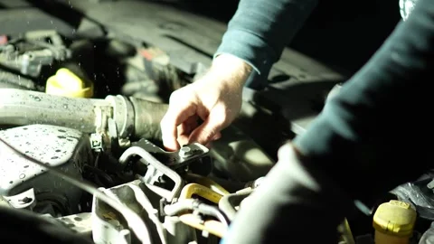 Pumping fuel into a diesel after replacing the fuel filter. Close-ups of fuel af Stock Footage 320128003