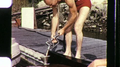 Pumping Gas in Boat Dockside Circa 1960 (Vintage Film 8mm Home Movie) 1108 Stock Footage 8926619