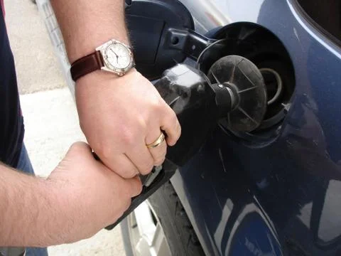 Pumping gas Stock Photos