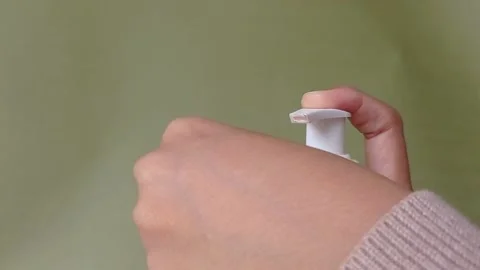 Pumping a hand lotion into the hand Stock Footage 150523234