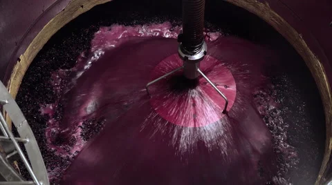 Pumping over up freshly squeezed juice Stock Footage 55420749