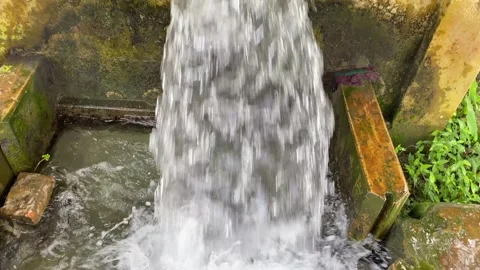 The pumping station where water is pumped from a irrigation canal system. Stock Footage 284946745