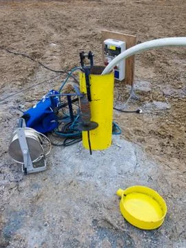 Pumping test of the borehole Stock Photos