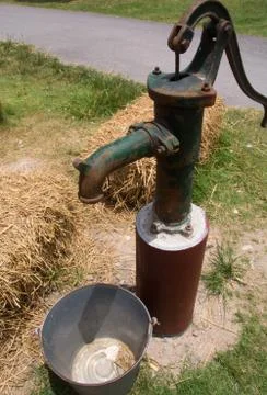 Pumping with a traditional pump. Stock Photos