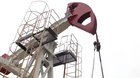 The pumping unit as the oil pump installed on a well Video stock 103624850