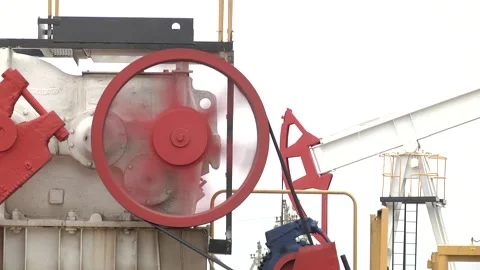 The pumping unit as the oil pump installed on a well Video stock 103625214
