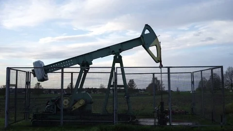 Pumping unit is working in oil field in Lower Saxony near Hannover Stock Footage 81413114