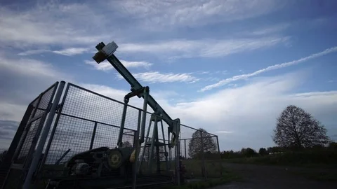 Pumping unit is working in oil field in Lower Saxony near Hannover Stock Footage 81416518