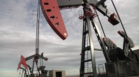 Pumping Units on a 4 Well Location Video stock 43043552