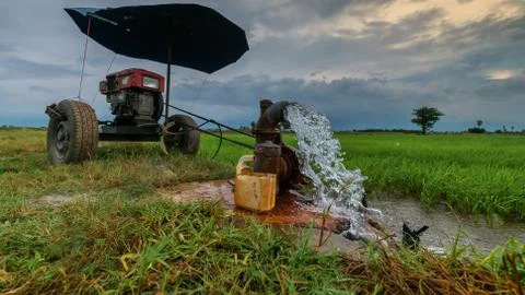 Pumping water into the fields Stock Photos