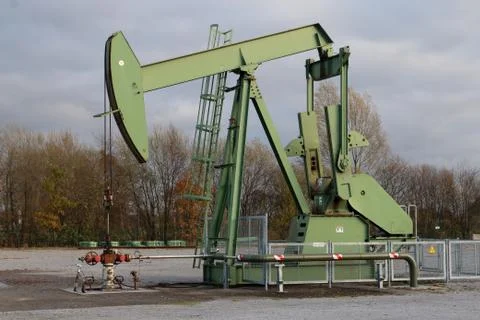 Pumpjack pumping oil Stock Photos