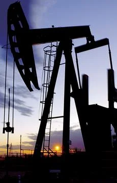 Pumpjack silhouette Stock Photos