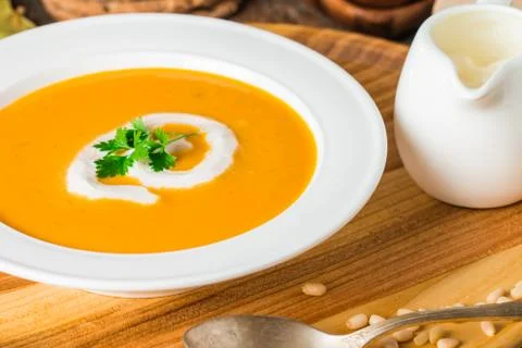 Pumpkin and carrot soup Stock Photos