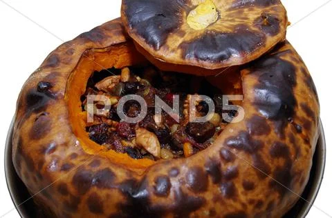 Pumpkin baked with fruit. Stock Photos