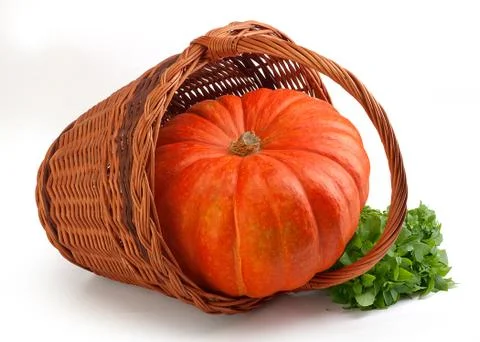 Pumpkin in the basket Stock Photos