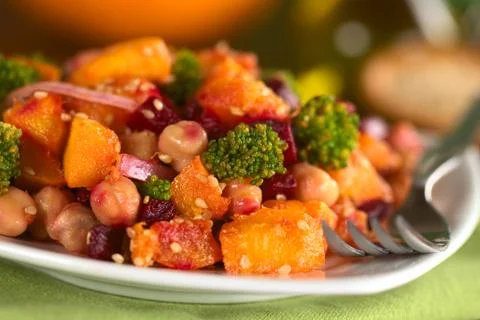 Pumpkin, beetroot, broccoli and chickpea salad Stock Photos