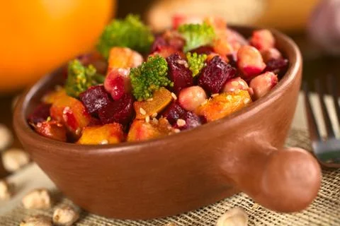 Pumpkin, beetroot, broccoli and chickpea salad Stock Photos