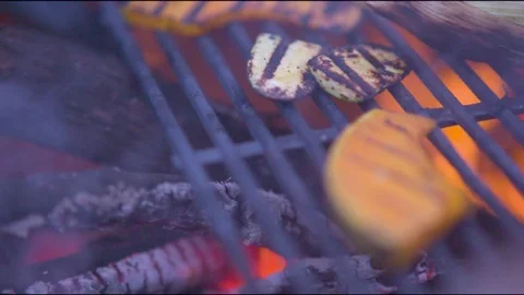 Pumpkin being cooked on barbecue grill Stock Footage 76101672