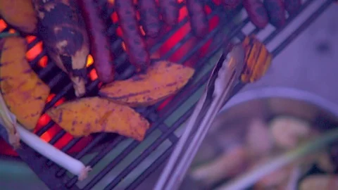 Pumpkin being cooked on barbecue grill Vídeos de archivo 76199079