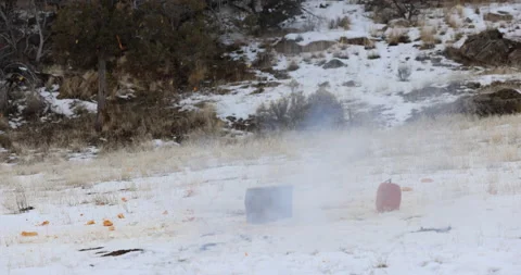 Pumpkin Blasting winter snow 4K Video stock 223998019