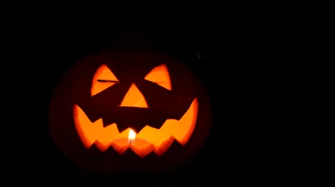 Pumpkin with burning candle Stock Footage 31461759