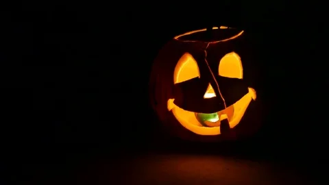 Pumpkin with burning candle, loop able Stock Footage 85111367
