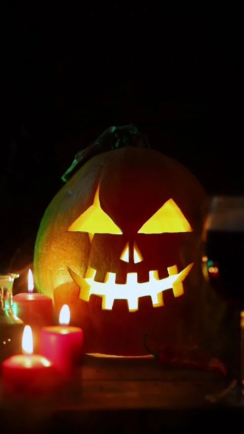 A pumpkin with a carved face Stock Footage 219945190