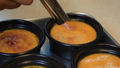 Pumpkin Creme. Caramelizing Creme brulee Stock Footage 89567047