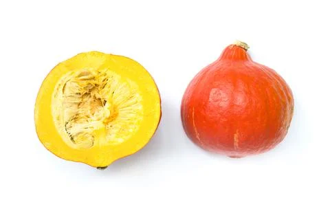 Pumpkin cut in half over white background Stock Photos