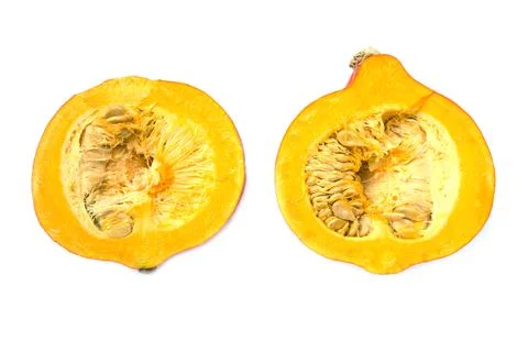 Pumpkin cut in half on white background Stock Photos