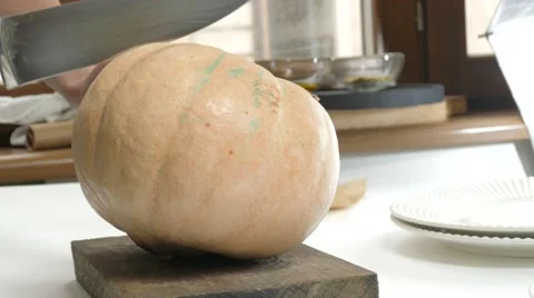 Pumpkin cutting and splitting, 4k Stock Footage 60777357
