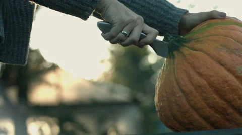 Pumpkin cutting and splitting Stock Footage 69055097