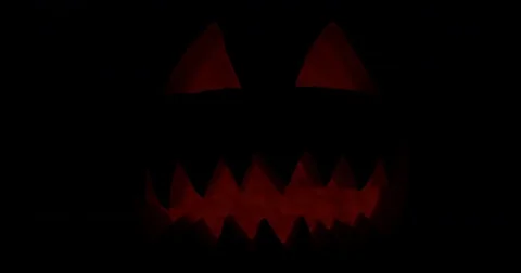 The pumpkin flickers in the dark Stock Footage 80135553