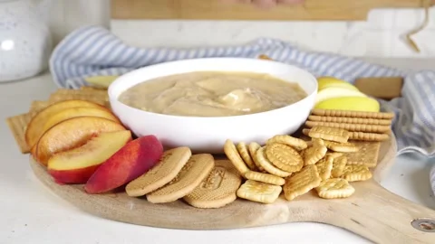Pumpkin Fluff, Pumpkin spice mousse dip with cookies Stock Footage 284842841
