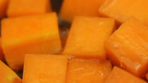 Pumpkin in frying pan; panning; close up;  Stock Footage 35921151
