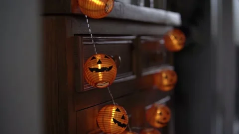 Pumpkin Halloween decoration hanging on string Stock Footage 164440253