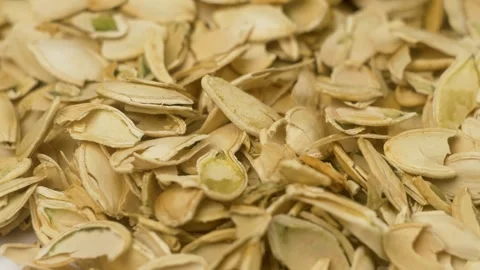 Pumpkin husks top view, close up. Empty shells without seeds rotation Stock Footage 267074016