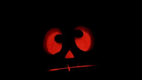 Pumpkin Jack o'latern burning in the darkness Stock Footage 70226395