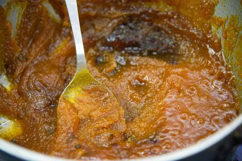 Pumpkin jam made in copper pot Stock Photos