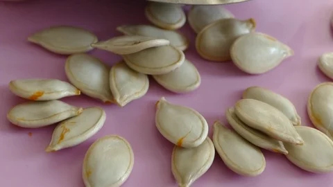 Pumpkin kernels in a plate,hd movie, 스톡 동영상 101062439