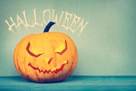 Pumpkin lantern with halloween greeting Stock Illustration