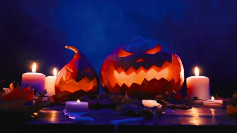 Pumpkin lanterns for Halloween on a blue background with smoke. Stock Footage 162549247