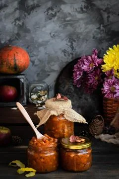 Pumpkin, lemon and apricot kernel jam. Stock Photos